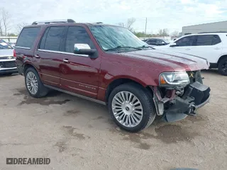 2015 Lincoln Navigator with VIN 5LMJJ2JT4FEJ12021, listed as a IAAI auction lot 41880471 with 104,979 mi miles. Bid and sale history available at carsss.com. Image 1.