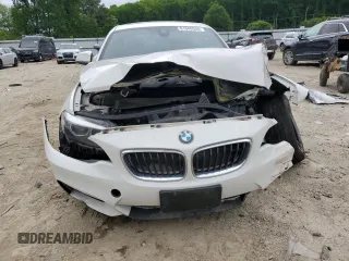 2018 BMW 2 Series 230i xDrive with VIN WBA2J3C54JVA49821, listed as a Copart auction lot 61046555 with 51,167 mi miles and Salvage title. Bid and sale history available at DreamBid. Image 5.