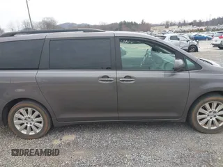 2015 Toyota Sienna Limited z VIN 5TDDK3DC6FS128167, wystawiony jako IAAI lot #41699588 z przebiegiem 179 723 mil mil oraz . Historia ofert i sprzedaży dostępna na DreamBid. Obrazek 13.