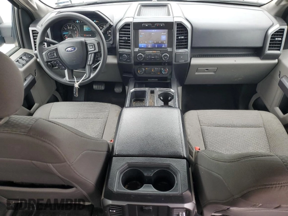 2020 Ford F-150 XL with VIN 1FTEW1E43LKD42136, listed as a Copart auction lot 59444145 with 142,294 mi miles and Salvage title. Bid and sale history available at DreamBid. Image 8.