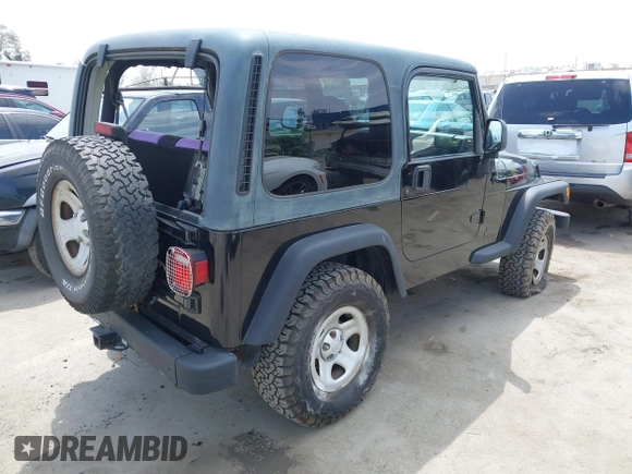 2002 Jeep Wrangler X with VIN 1J4FA39S32P738246, listed as a IAAI auction lot 42106359 with 266,993 mi miles and . Bid and sale history available at DreamBid. Image 4.