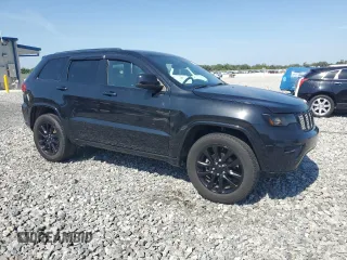 2017 Jeep Grand Cherokee Altitude with VIN 1C4RJEAG0HC888207, listed as a Copart auction lot 57472635 with 67,529 mi miles and Salvage title. Bid and sale history available at DreamBid. Image 4.