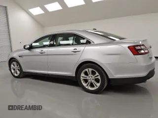 2016 Ford Taurus SE z VIN 1FAHP2D88GG126947, wystawiony jako Copart lot #55256955 z przebiegiem 88 821 mil mil oraz Czysty tytuł • Clean title. Historia ofert i sprzedaży dostępna na DreamBid. Obrazek 2.