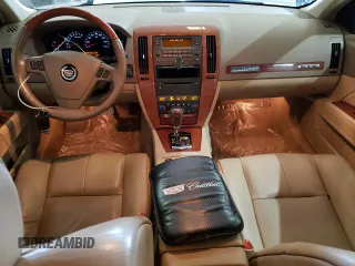 2007 Cadillac STS z VIN 1G6DW677170153246, wystawiony jako Copart lot #59531015 z przebiegiem 65 092 mil mil oraz Szkoda całkowita • Salvage title. Historia ofert i sprzedaży dostępna na DreamBid. Obrazek 8.
