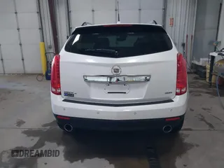 2014 Cadillac SRX Performance Collection with VIN 3GYFNFE36ES615440, listed as a IAAI auction lot 41830849 with 125,128 mi miles and . Bid and sale history available at DreamBid. Image 17.