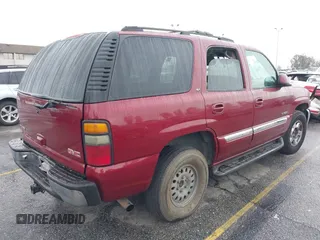 2004 GMC Yukon SLT with VIN 1GKEC13T44R322378, listed as a IAAI auction lot 41500951 with 1 mi miles. Bid and sale history available at carsss.com. Image 4.