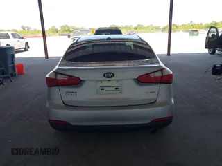 2016 Kia Forte EX with VIN KNAFX4A81G5528190, listed as a IAAI auction lot 42142075 with 162,056 mi miles. Bid and sale history available at carsss.com. Image 16.