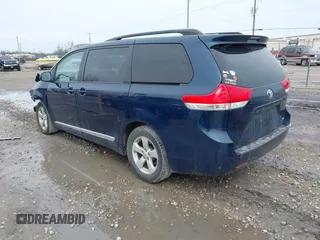 2011 Toyota Sienna LE AAS with VIN 5TDKK3DC4BS094456, listed as a IAAI auction lot 41956894 with 176,882 mi miles. Bid and sale history available at carsss.com. Image 3.