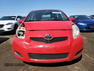 2009 Toyota Yaris with VIN JTDKT903095246576, listed as a Copart auction lot 52150915 with 90,276 mi miles and Salvage Title. Bid and sale history available at DreamBid. Image 5.