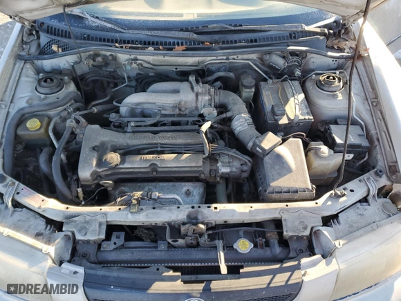 1997 Mazda Protege DX with VIN JM1BC1413V0162950, listed as a Copart auction lot 45986535 with 0 mi miles and Salvage Title. Bid and sale history available at carsss.com. Image 11.