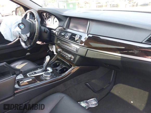 2015 BMW 5 Series 528i xDrive with VIN WBA5A7C57FD628557, listed as a IAAI auction lot 42519487 with 167,049 mi miles and . Bid and sale history available at DreamBid. Image 5.