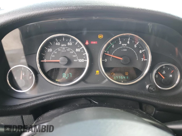 2012 Jeep Wrangler Unlimited Sport z VIN 1C4BJWDG8CL220960, wystawiony jako Copart lot #57823315 z przebiegiem 177 541 mil mil oraz Szkoda całkowita • Salvage title. Historia ofert i sprzedaży dostępna na DreamBid. Obrazek 9.
