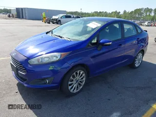 2014 Ford Fiesta SE with VIN 3FADP4BJ5EM190009, listed as a IAAI auction lot 42036976 with 157,575 mi miles. Bid and sale history available at carsss.com. Image 2.