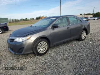 2014 Toyota Camry L with VIN 4T1BF1FK5EU797699, listed as a Copart auction lot 50697855 with 200,463 mi miles and Salvage Title. Bid and sale history available at carsss.com. Image 1.