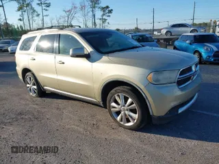 2012 Dodge Durango Crew with VIN 1C4SDHDT5CC204912, listed as a IAAI auction lot 41607315 with 209,985 mi miles. Bid and sale history available at carsss.com. Image 1.