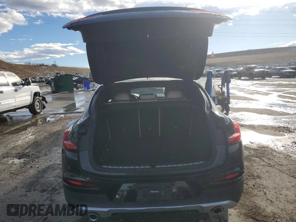 2020 BMW X4 xDrive30i with VIN 5UX2V1C01L9B30138, listed as a Copart auction lot 46612965 with 59,493 mi miles and Salvage Title. Bid and sale history available at carsss.com. Image 6.