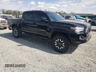 2023 Toyota Tacoma SR with VIN 3TYAX5GN2PT068021, listed as a Copart auction lot 76362104 with 41,757 mi miles and Salvage title. Bid and sale history available at DreamBid. Image 4.