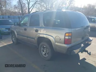 2002 Chevrolet Tahoe Z71 with VIN 1GNEK13Z32R125421, listed as a IAAI auction lot 41859011 with 216,021 mi miles. Bid and sale history available at carsss.com. Image 3.