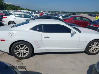 2015 Chevrolet Camaro LS z VIN 2G1FB1E37F9293805, wystawiony jako IAAI lot #42393142 z przebiegiem 138 288 mil mil oraz . Historia ofert i sprzedaży dostępna na DreamBid. Obrazek 13.