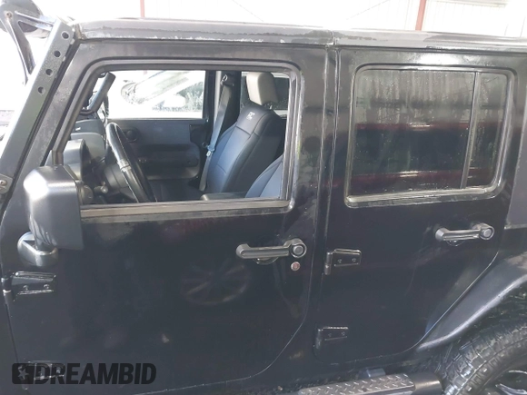 2008 Jeep Wrangler Unlimited Rubicon with VIN 1J8GA69108L562705, listed as a IAAI auction lot 41306923 with 150,002 mi miles and . Bid and sale history available at DreamBid. Image 14.