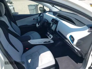 2016 Toyota Prius Four with VIN JTDKARFUXG3511034, listed as a IAAI auction lot 42137394 with 77,424 mi miles. Bid and sale history available at carsss.com. Image 5.