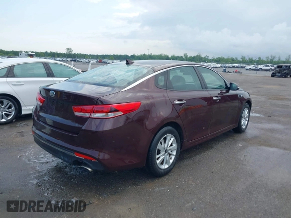 2016 Kia Optima LX with VIN 5XXGT4L32GG105361, listed as a IAAI auction lot 42066431 with 61,026 mi miles. Bid and sale history available at carsss.com. Image 4.