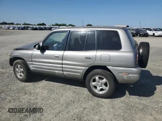 1999 Toyota RAV4 with VIN JT3GP10V5X7053634, listed as a Copart auction lot 52761695 with 236,443 mi miles and Salvage title. Bid and sale history available at DreamBid. Image 2.