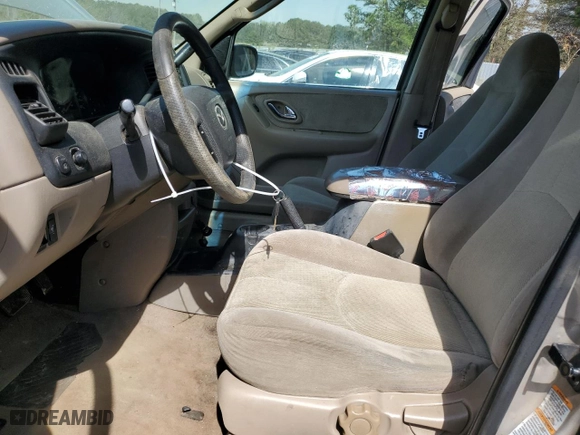 2001 Mazda Tribute LX with VIN 4F2YU091X1KM39019, listed as a Copart auction lot 50946945 with 255,148 mi miles and Salvage Title. Bid and sale history available at carsss.com. Image 7.