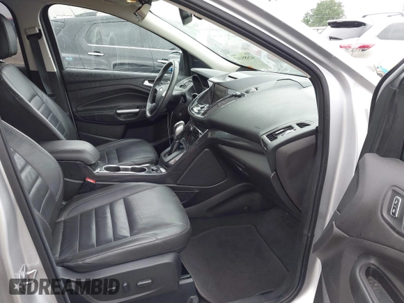 2015 Ford Escape Titanium with VIN 1FMCU0JX7FUB60418, listed as a IAAI auction lot 42485107 with 82,172 mi miles and . Bid and sale history available at DreamBid. Image 5.