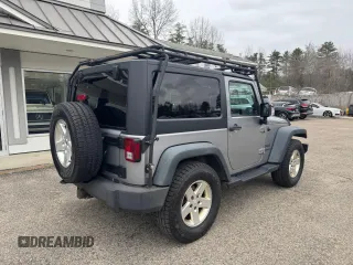 2013 Jeep Wrangler Sport with VIN 1C4AJWAG7DL605881, listed as a Copart auction lot 53525105 with 214,662 mi miles and Clean Title. Bid and sale history available at carsss.com. Image 4.
