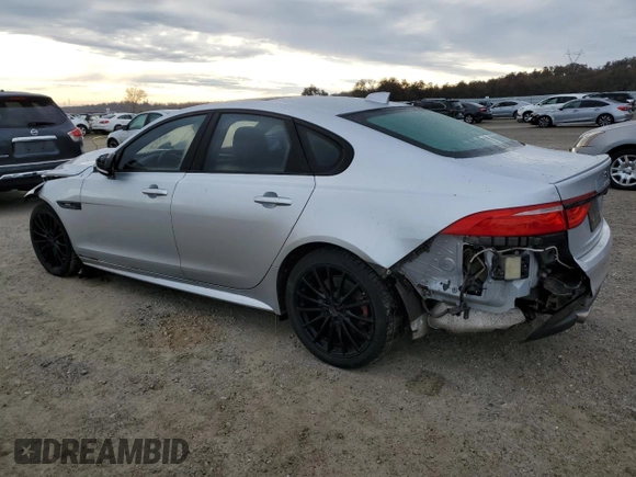 2016 Jaguar XF with VIN SAJBL4BV6GCY16964, listed as a Copart auction lot 82786584 with 100,587 mi miles and Salvage Title. Bid and sale history available at DreamBid. Image 2.
