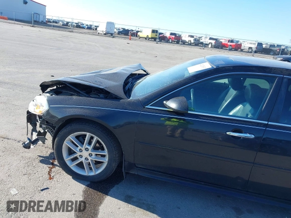 2013 Chevrolet Impala LTZ with VIN 2G1WC5E3XD1237776, listed as a IAAI auction lot 42023033 with 143,279 mi miles and . Bid and sale history available at DreamBid. Image 14.