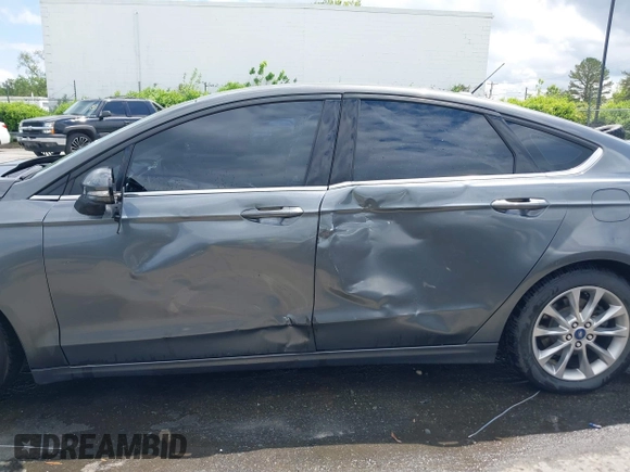 2016 Ford Fusion SE Hybrid с VIN 3FA6P0LU6GR127095, выставлен на аукционе IAAI как лот 42013324 с пробегом 134 474 миль миль и . История ставок и продаж доступна на DreamBid. Изображение 14.