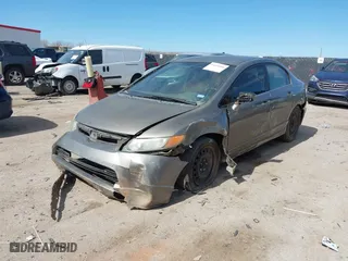 2006 Honda Civic Sdn LX with VIN 1HGFA16566L135606, listed as a IAAI auction lot 41654366 with 196,676 mi miles. Bid and sale history available at carsss.com. Image 17.