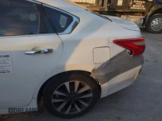2017 Nissan Altima SV with VIN 1N4AL3AP3HC285236, listed as a IAAI auction lot 41272147 with 246,465 mi miles and . Bid and sale history available at carsss.com. Image 6.