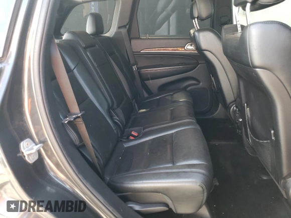 2011 Jeep Grand Cherokee Limited with VIN 1J4RR5GT2BC677640, listed as a Copart auction lot 68012754 with 138,208 mi miles and Salvage title. Bid and sale history available at DreamBid. Image 11.