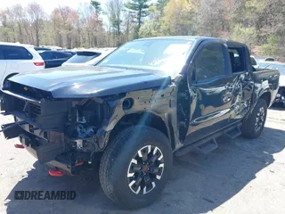 2023 Nissan Frontier SV with VIN 1N6ED1EK9PN636825, listed as a IAAI auction lot 42090391 with 30,863 mi miles and . Bid and sale history available at DreamBid. Image 2.