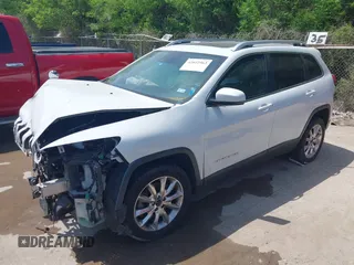 2015 Jeep Cherokee Limited with VIN 1C4PJLDS8FW566065, listed as a IAAI auction lot 42032563 with 181,937 mi miles and . Bid and sale history available at DreamBid. Image 16.