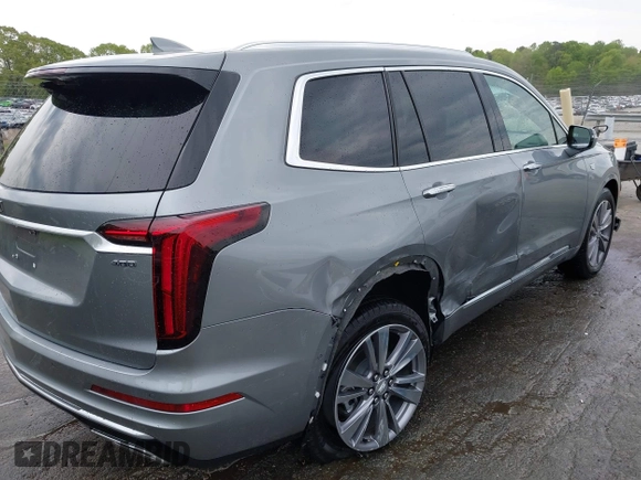 2024 Cadillac XT6 FWD Premium Luxury with VIN 1GYKPCRS0RZ748048, listed as a IAAI auction lot 42043117 with 7,232 mi miles. Bid and sale history available at carsss.com. Image 6.