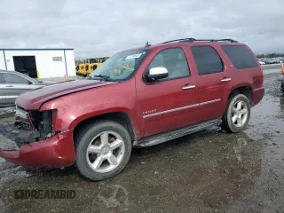 2010 Chevrolet Tahoe LTZ with VIN 1GNUKCE06AR103546, listed as a Copart auction lot 47254645 with 244,539 mi miles and Salvage title. Bid and sale history available at DreamBid. Image 1.