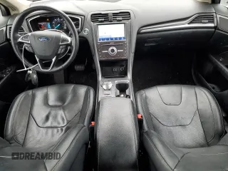 2019 Ford Fusion Titanium with VIN 3FA6P0D99KR242616, listed as a Copart auction lot 57525635 with 79,518 mi miles and Salvage title. Bid and sale history available at DreamBid. Image 8.