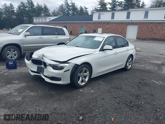 2015 BMW 3 Series 328i xDrive with VIN WBA3B5G50FNS15117, listed as a IAAI auction lot 41843496 with 144,613 mi miles. Bid and sale history available at carsss.com. Image 2.
