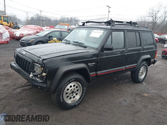 1995 Jeep Cherokee Sport with VIN 1J4FJ68S7SL572730, listed as a IAAI auction lot 41474520 with 189,907 mi miles. Bid and sale history available at carsss.com. Image 2.