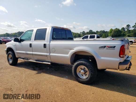 1999 Ford F-350 XL with VIN 1FTSW31S2XEE89071, listed as a Copart auction lot 61016685 with 115,130 mi miles and Salvage title. Bid and sale history available at DreamBid. Image 2.