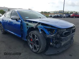 2018 Kia Stinger GT with VIN KNAE35LC5J6010230, listed as a IAAI auction lot 41924415 with 123,572 mi miles. Bid and sale history available at carsss.com. Image 1.