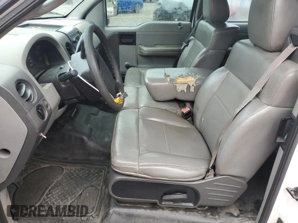 2005 Ford F-150 XLT with VIN 1FTPX12555NB22758, listed as a Copart auction lot 57228785 with 171,230 mi miles and Salvage title. Bid and sale history available at DreamBid. Image 7.