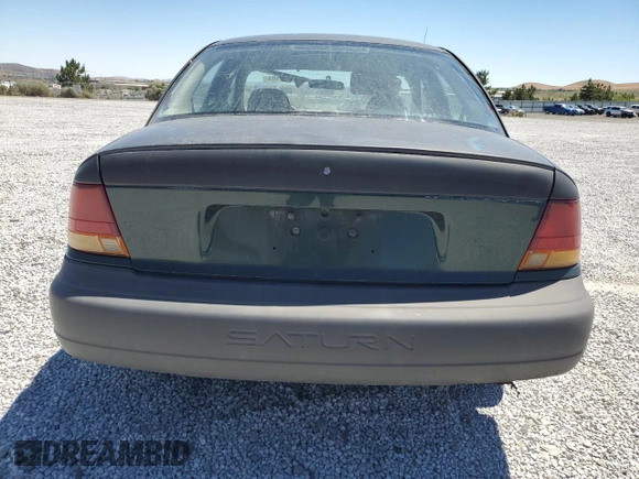 1996 Saturn SL with VIN 1G8ZG5289TZ221271, listed as a Copart auction lot 65957104 with 315,496 mi miles and Salvage Title. Bid and sale history available at carsss.com. Image 6.