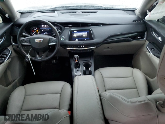 2023 Cadillac XT4 FWD Premium Luxury with VIN 1GYFZCR48PF100078, listed as a Copart auction lot 55955865 with 23,509 mi miles and Salvage title. Bid and sale history available at DreamBid. Image 8.