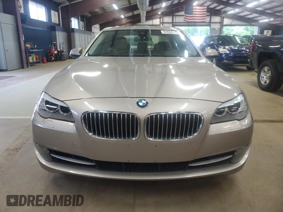 2013 BMW 5 Series 535i xDrive with VIN WBAFU7C57DDU74909, listed as a Copart auction lot 64053715 with 115,521 mi miles and Clean title. Bid and sale history available at DreamBid. Image 5.