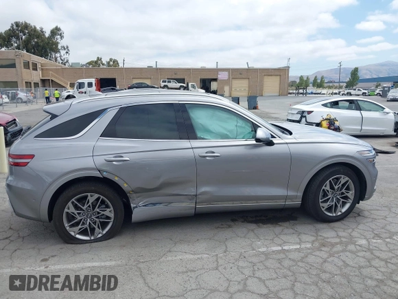 2022 Genesis GV70 2.5T with VIN KMUMADTB7NU066965, listed as a IAAI auction lot 42363654 with 25,892 mi miles and . Bid and sale history available at DreamBid. Image 14.